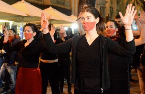 Protesters in face paint perform a dance during a march in memory of Manuel Gutiérrez, a high school student who was shot by police during a protest in 2011. Chile dismissed five policemen in the wake of the incident.