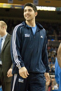 Kazemi, shown here during a timeout at UCLA’s Wednesday night loss to USC, was recently placed on scholarship by UCLA’s coaching staff.