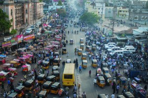 A view of the Laad Bazaar from atop the Charminar (four minarets, built 1591). The streets are lined with the ubiquitous black and yellow auto-rickshaws while pedestrians walk to and fro on the roads, absolutely carefree. This part of Hyderabad, also referred to as “Old Hyderabad” was at the time of the British Raj and even before it, territory of the Muslim royalty (Nawabs) that ruled the state of Hyderabad.  