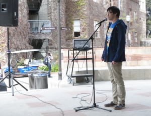 Mario Pizarro, a third-year microbiology, immunology and molecular genetics student, reveals that he is an undocumented individual on Wednesday in Bruin Plaza. Several students did so as part of Immigrant Awareness Week.