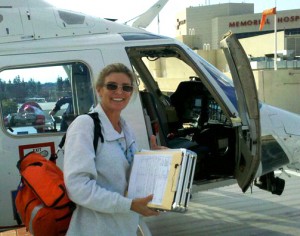 Flight nurse Kimberly Snow prepares for a transport. She and other nurses undergo special training to fly in helicopters. 