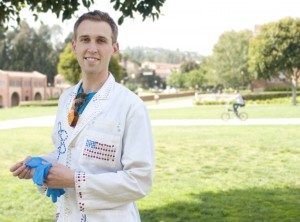 Jeffrey Vinokur, a biochemistry doctoral student and performer of “The Dancing Scientist,” wears his signature lab coat from his videos. He has toured the country performing his educational show, which combines science and dance.