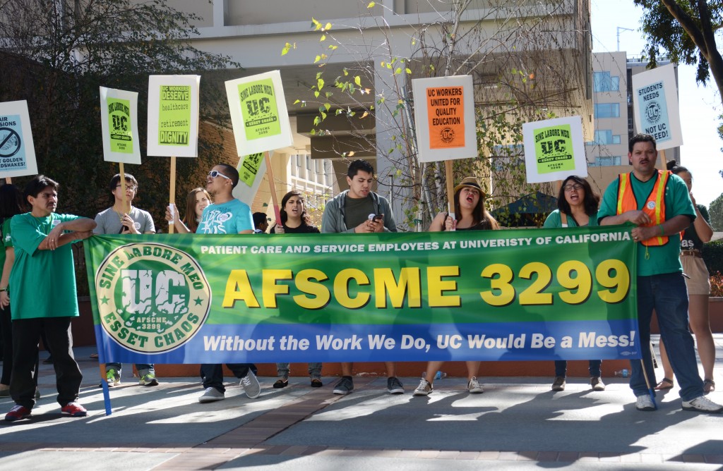 The American Federation of State, County and Municipal Employees Local 3299 represents patient care workers in the University of California health systems. Above, AFSCME workers protest outside Covel Commons.