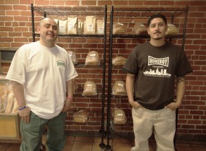 Alex Rocio (left) and Jayme Puente (right) help manage the Westwood branch of Homeboy Industries, which includes several divisions, such as Homeboy Bakery, Homegirl Cafe & Catering and Homeboy Silkscreen & Embroidery.