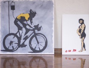 “Lance Armstrong” is a spray painting that depicts Lance Armstrong replacing his blood during a race. “Caveman” explores the issue of obesity in America through the depiction of a caveman on a McDonald’s diet.