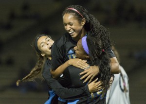 Sophomore forward Darian Jenkins (middle) was the first player to break the deadlock against Cal after she latched onto a cross from junior forward Taylor Smith (right). Aubrey Yeo/Daily Bruin senior staff)