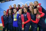 Former UCLA women's and men's water polo coach Adam Krikorian got to wear all 13 of his athletes' medals after USA beat Italy 12-5. (Peter Casey-USA TODAY Sports)